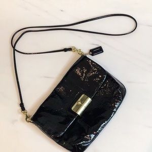 Black patent leather handbag